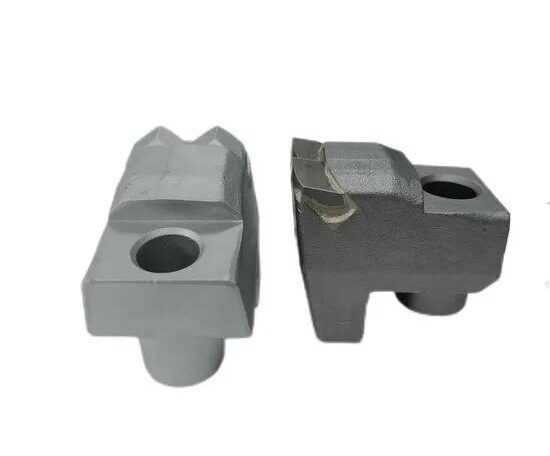 Forestry mulcher carbide tooth and holder showing the mounting connection